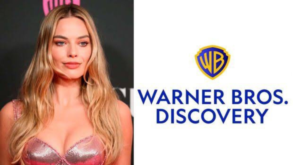 Reprodução: Warner Bros. Margor Robbie assina contrato com a Warner.